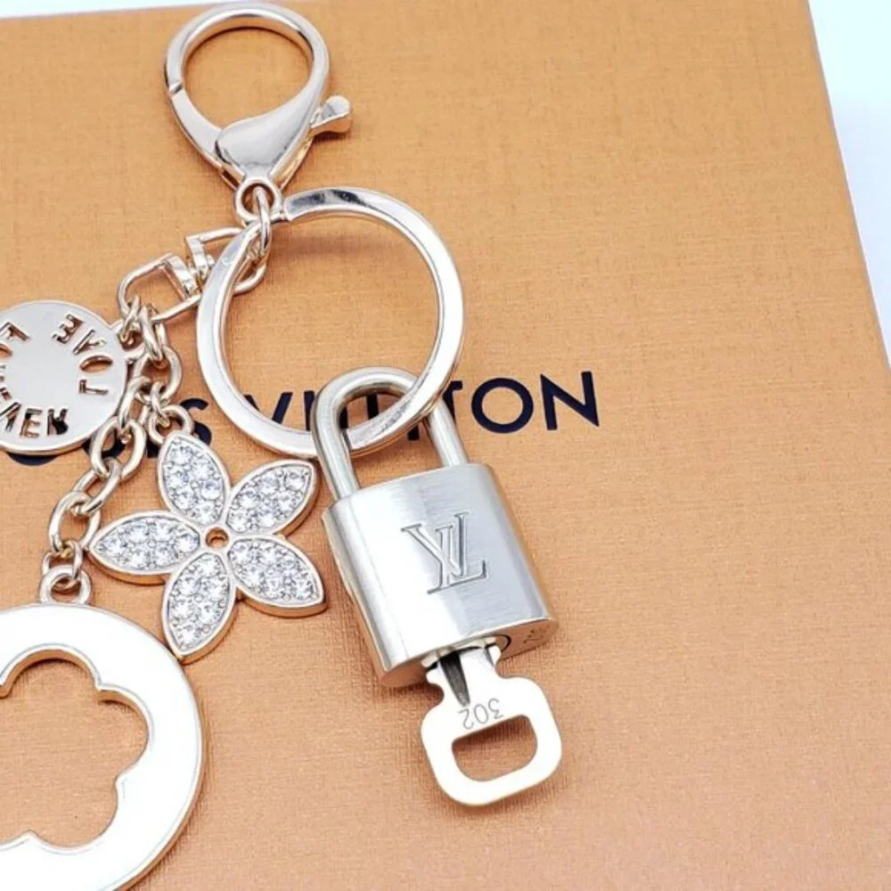 Authentic Louis Vuitton Gold Lock & Box w/ Unbranded Flower Bagcharm 120825